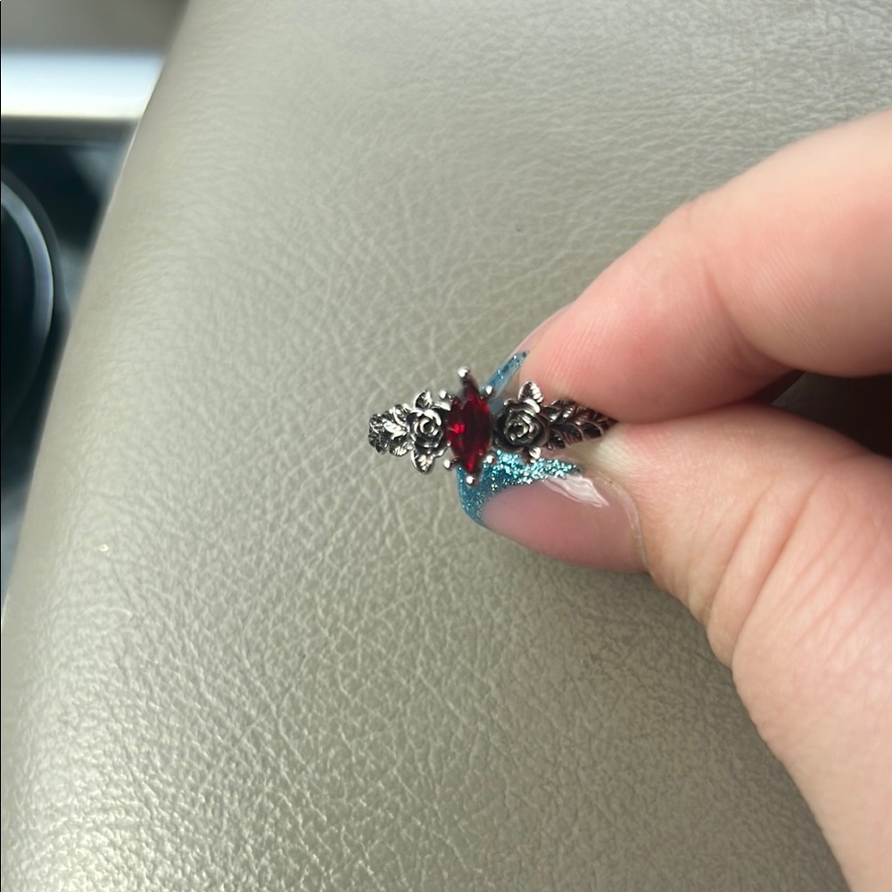 Elegant Silver and Red Gemstone Ring